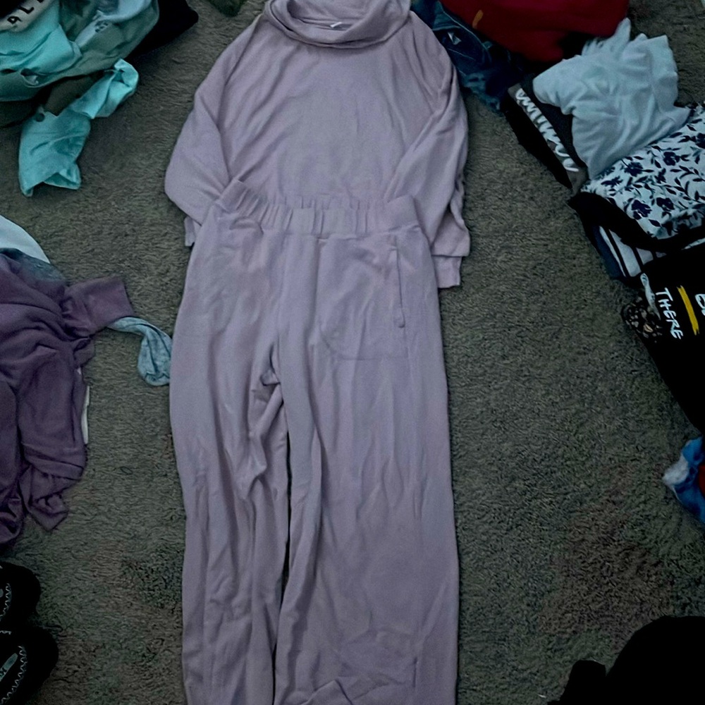 Pink comfy lounge set with pockets in the pants.